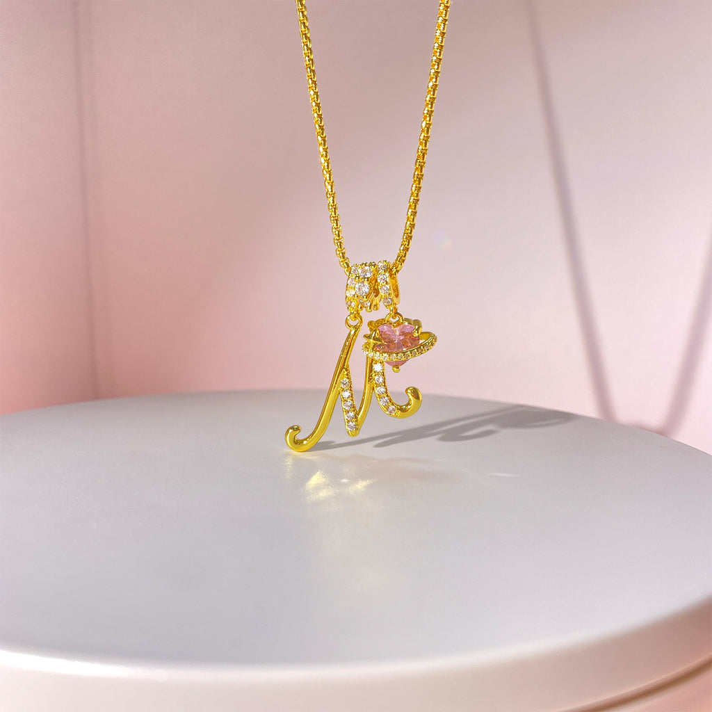 Shine bright with the Vibrant Initial Necklace! ✨