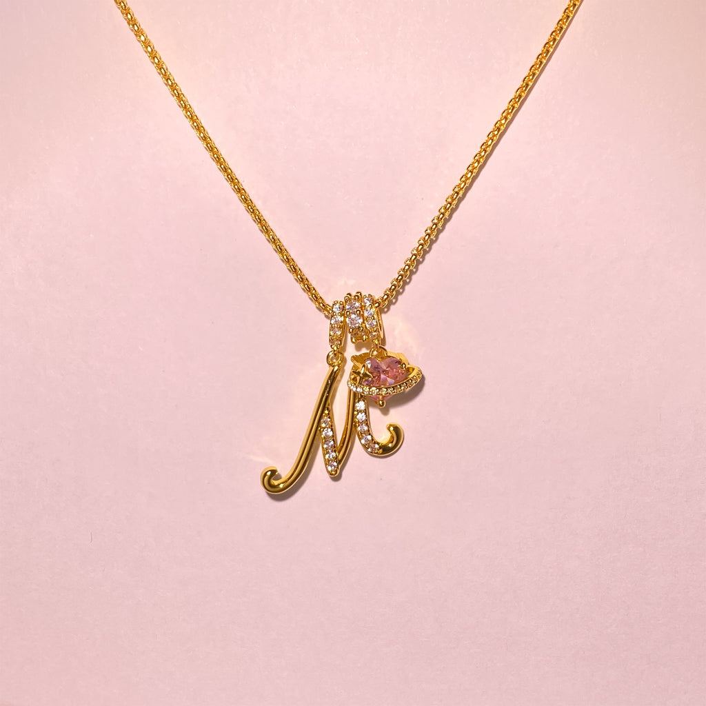 Shine bright with the Vibrant Initial Necklace! ✨