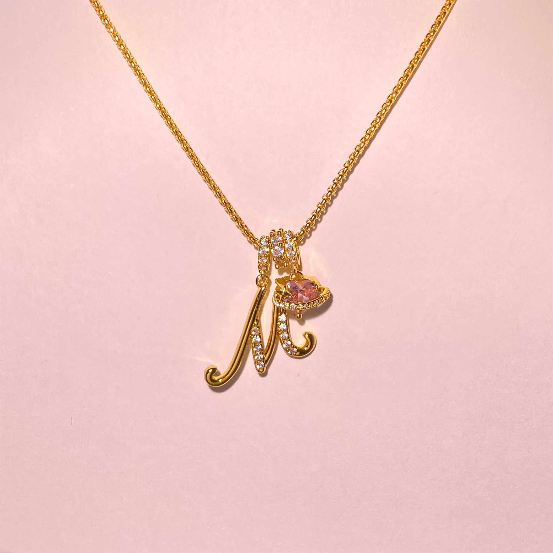 Shine bright with the Vibrant Initial Necklace! ✨